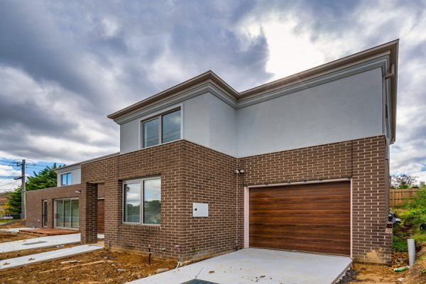 Portabella finish (knotted walnut) Home Garage Doors