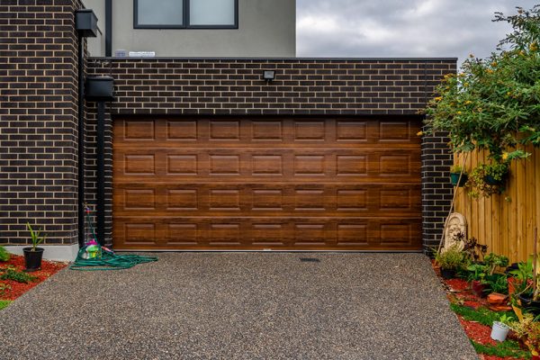 Classic Panel and Portabella finish (golden oak) Garage Doors