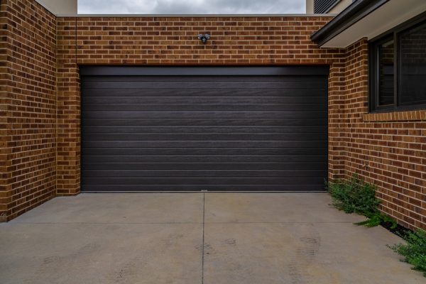 Slimline Monument with pelmet Garage Doors